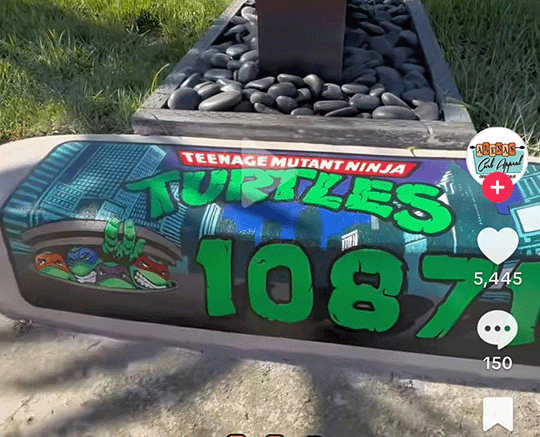 Incredible custom curb painting design of a sports logo on a curb